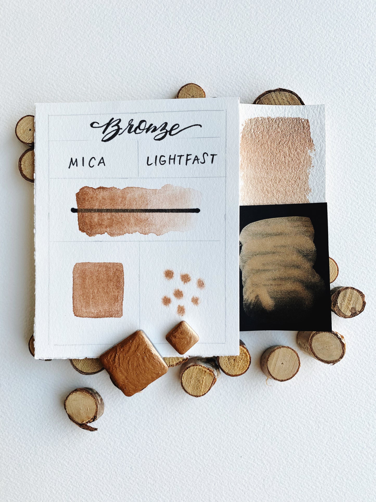 Handmade Bronze watercolor pan — warm metallic bronze pigment with shimmer in metal pan.