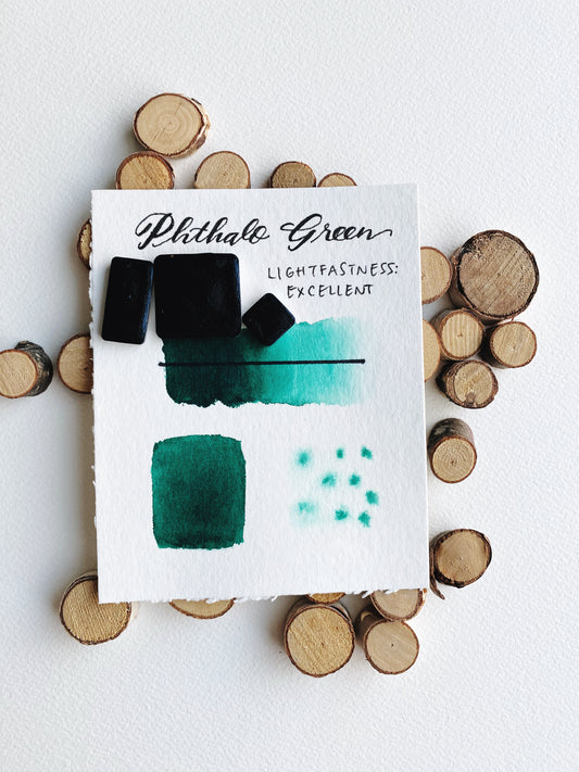 Handmade Phthalo Green watercolor pan, deep vivid green pigment.