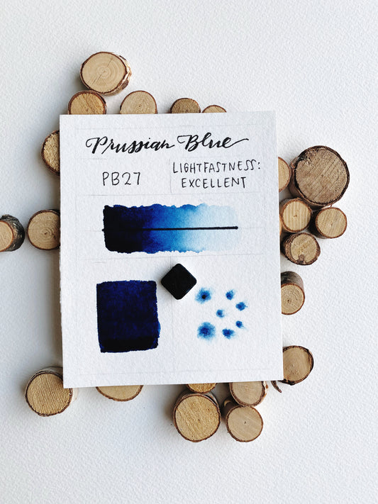 Handmade Prussian Blue watercolor pan — deep inky blue pigment in metal pan.
