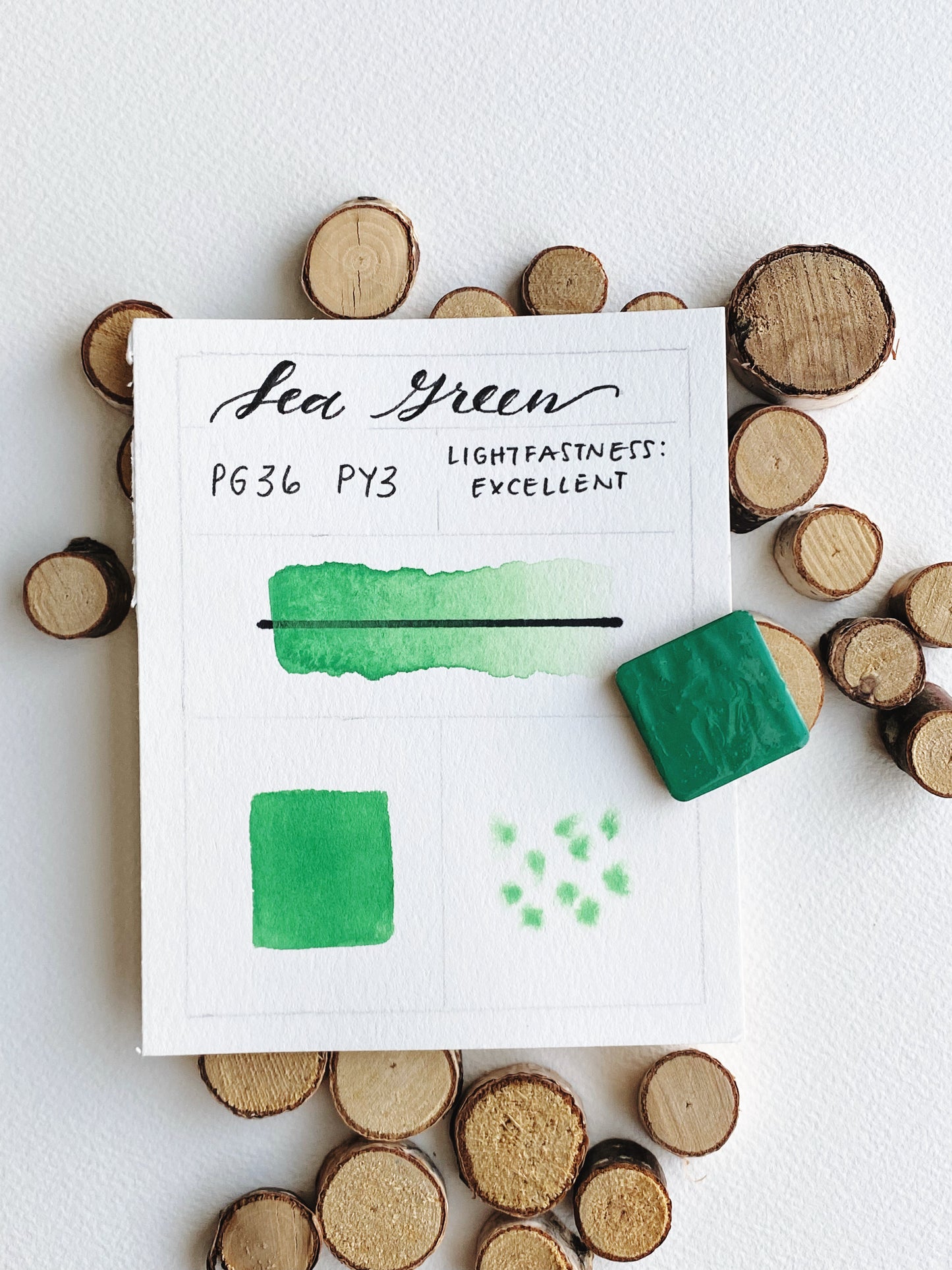 Handmade Sea Green watercolor pan, bright green blend of PG36 and PY3.