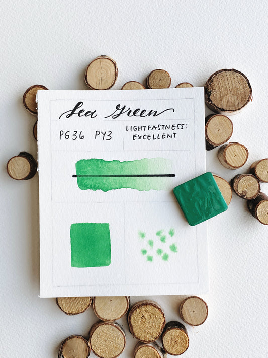 Handmade Sea Green watercolor pan, bright green blend of PG36 and PY3.